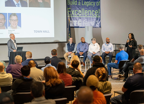 DTE Executive Chairman Jerry Norcia and a panel of 4 DTE employees on stage for Mental Health Town Hall