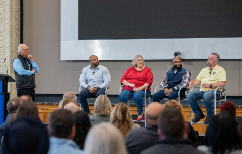 CEO Jerry Norcia and a panel of 4 DTE employees on stage for Mental Health Town Hall